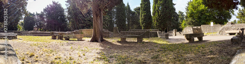 Immersive panoramic 180 degree view of ancient Roman necropolis landmark in the archaeological excavations of Ostia Antica with many sarcophagus and graves - Rome