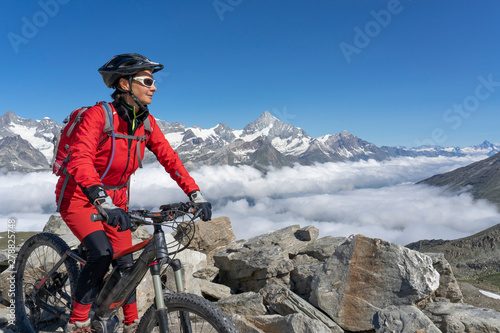 active senior woman, riding...
