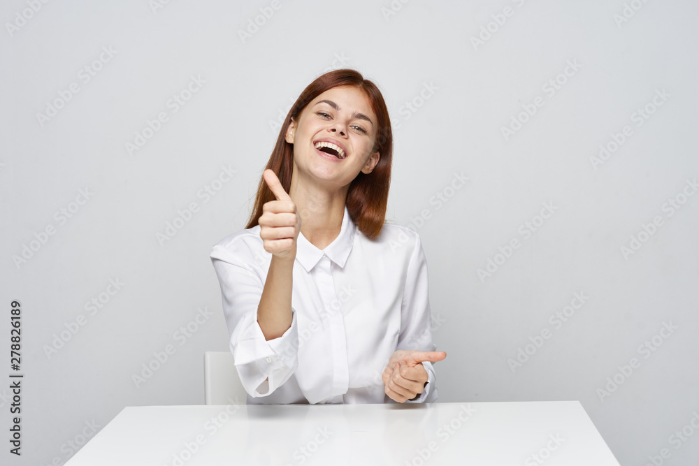 business woman sitting at desk with laptop business woman sitting at desk with laptop