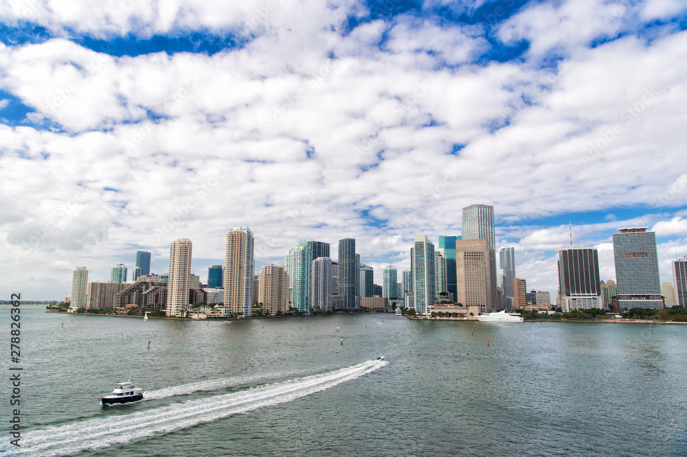 Skyscrapers and azure ocean water. Must see attractions. Miami has an Atlantic Ocean waterfront lined with marinas. Downtown Miami is urban city center based around Central Business District of Miami