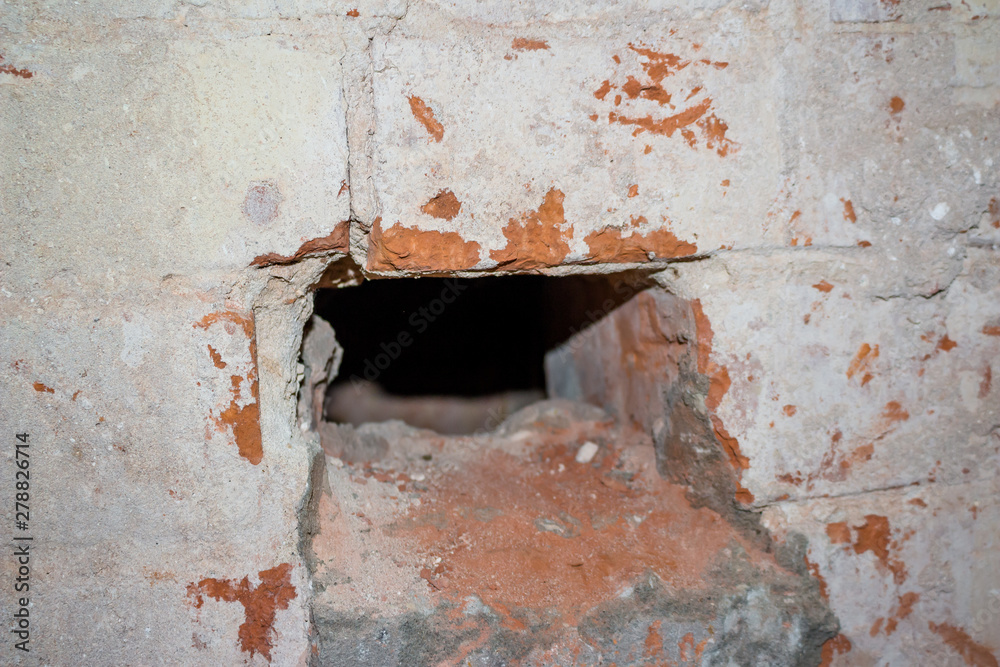 Break in the wall, search for treasure. Hiding place in the wall Break in the wall, search for treasure. Hiding place in the wall