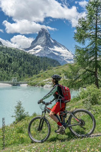 active senior woman, riding...