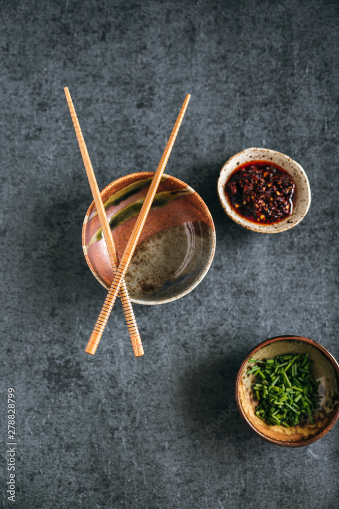 Fototapeta premium Stone Bowls with Condiments
