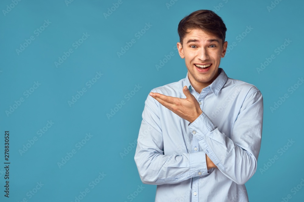 portrait of young man with arms crossed portrait of young man with arms crossed