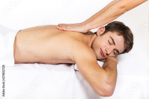 Young Man Getting A Massage