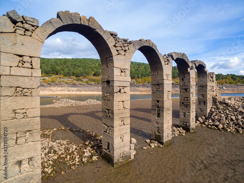 Monastery in ruins of a village in a dry swamp la cuerda el pozo in the province of Soria, the muedra photo