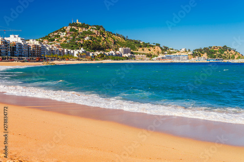 Sea landscape in Blanes, Catalonia, Spain near of Barcelona. Scenic town with nice sand beach and clear blue water in beautiful bay. Famous tourist resort destination in Costa Brava