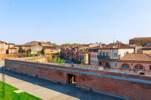 Fototapeta Naklejka Na Ścianę i Meble -  French ancient town Toulouse and Garonne river panoramic view. Toulouse is the capital of Haute Garonne department and Occitanie region, France, South Europe. Famous city and tourist destionation.
