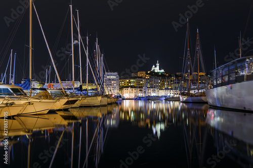 Wallpaper Mural Night view of French historical city Marseille and Mediterranean sea coast. Marseille is the biggest port in France, South Europe. Famous large city and tourist destionation. Torontodigital.ca