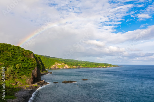 Rainbow over bay, Haleakala National Park, Maui, Hawaii, USA photo