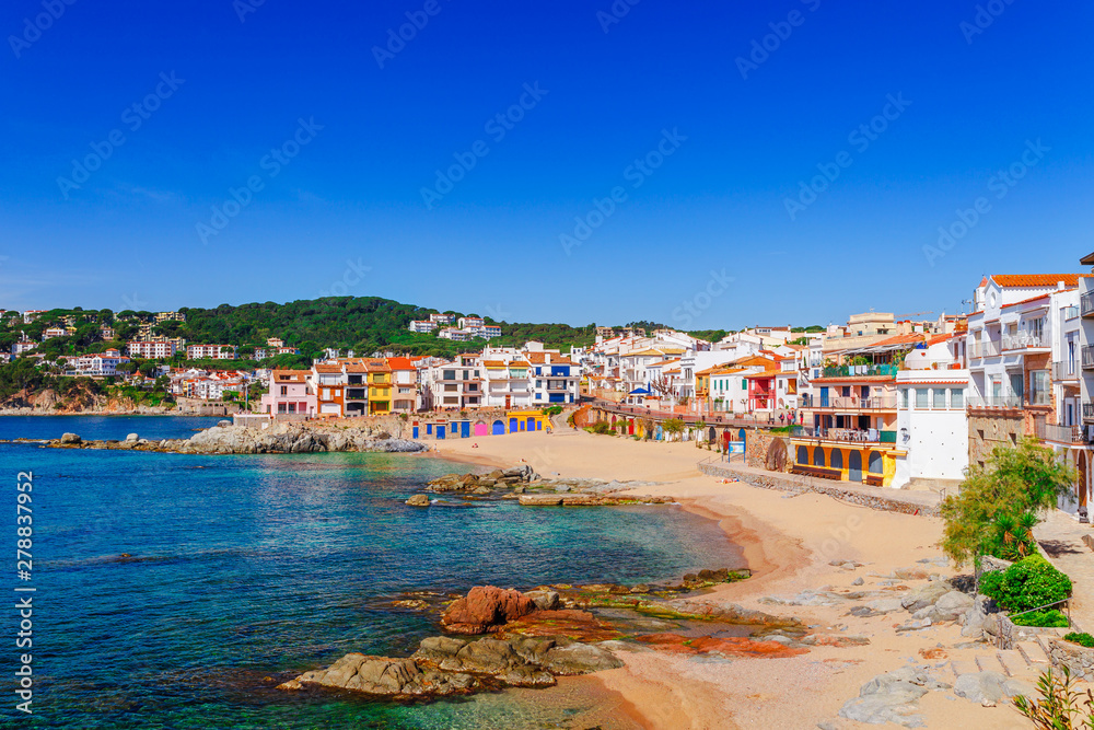 Fototapeta premium Sea landscape with Calella de Palafrugell, Catalonia, Spain near of Barcelona. Scenic fisherman village with nice sand beach and clear blue water in nice bay. Famous tourist destination in Costa Brava
