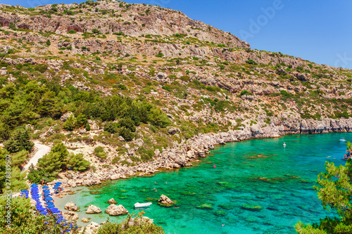 Sea skyview landscape photo Anthony Quinn bay near Ladiko bay on Rhodes island, Dodecanese, Greece. Panorama with nice sand beach and clear blue water. Famous tourist destination in South Europe