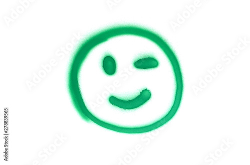 Graffiti smile sign sprayed on white isolated background
