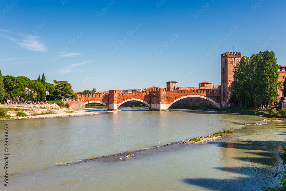 Panoramic cityscape aerial view on Verona historical center, bridge and Adige river. Famous travel destination in Italy. Old town where lived Romeo and Juliet from Shakespeare story