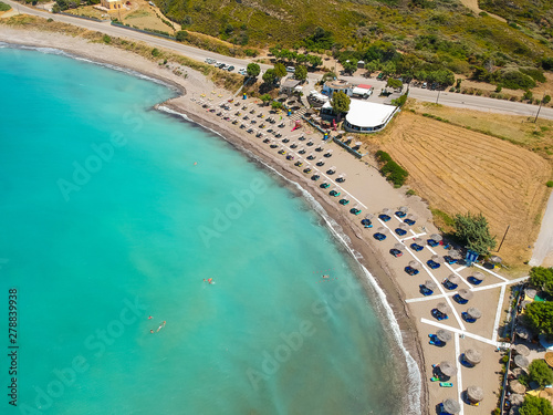 Aerial birds eye view drone photo beach on Rhodes island  Dodecanese  Greece. Panorama with nice lagoon and clear blue water. Famous tourist destination in South Europe
