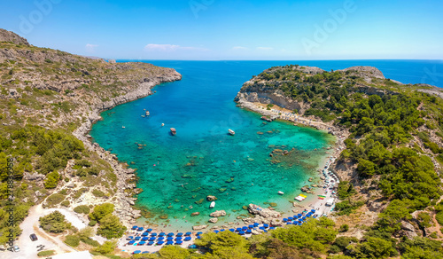 Aerial birds eye view drone photo Anthony Quinn near Ladiko bay on Rhodes island, Dodecanese, Greece. Panorama with nice lagoon and clear blue water. Famous tourist destination in South Europe