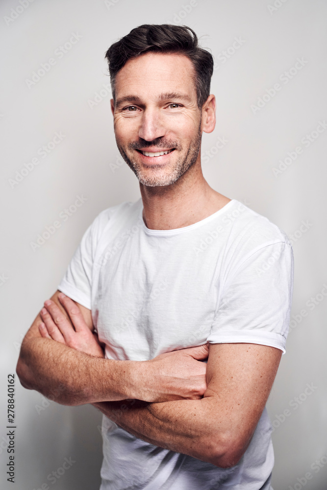 Portrait of man wearing white t-shirt