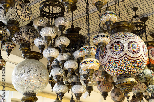 Beautifully decorated chandeliers and lamps