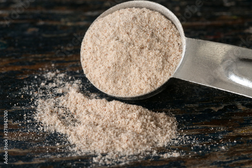 Psyllium Husk Fiber Spilled from a Teaspoon photo