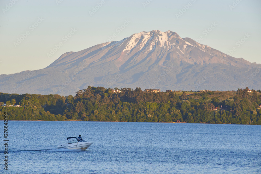 people enjoying and doing sports in the lake of Puerto Varas, Chile