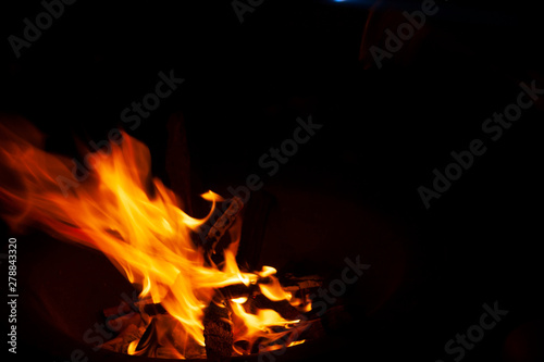 in flames drye sticks at nigth © Amalia
