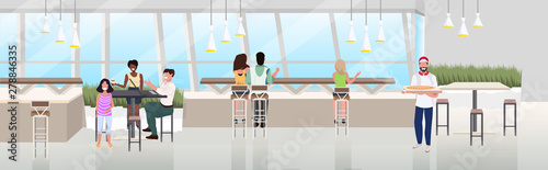 mix race people sitting cafe table spending time at restaurant modern pizzeria interior flat horizontal banner full length