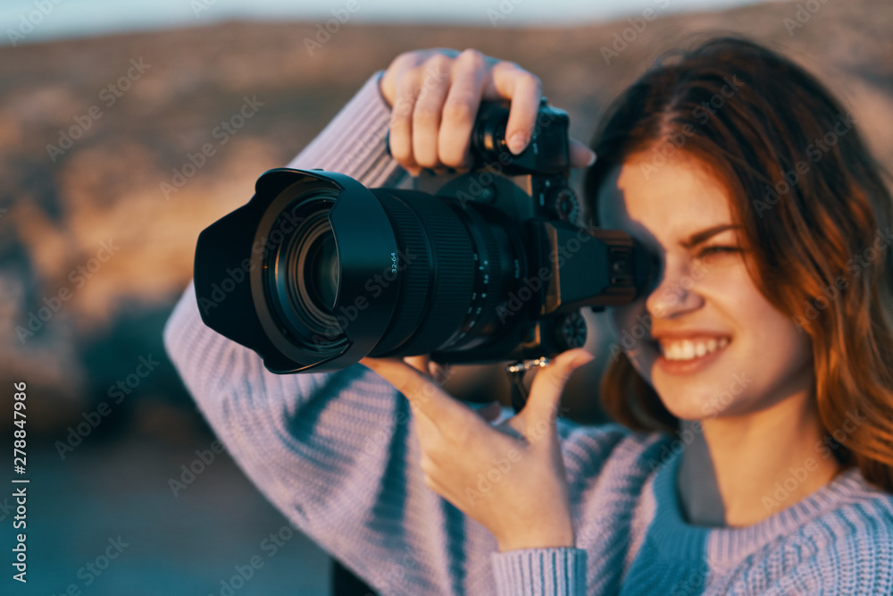 woman taking photo with digital camera woman taking photo with digital camera