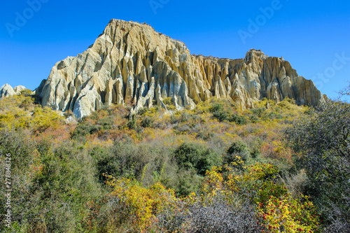 Huge sharp pinnacles of the Omarama Clay Cliffs, South island, New Zealand photo