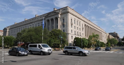 Daytime establishing shot of the Department of Justice Building in downtown Washington, D.C. photo