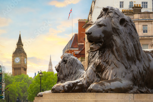 Canvas Print Lion Sculpture at Trafalgar Square in London, UK