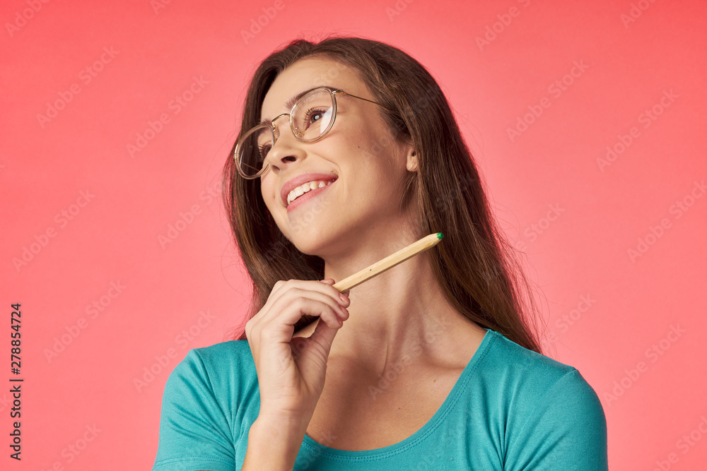 young woman with finger on her lips young woman with finger on her lips