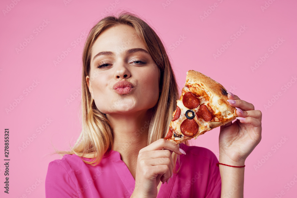 young woman eating cake