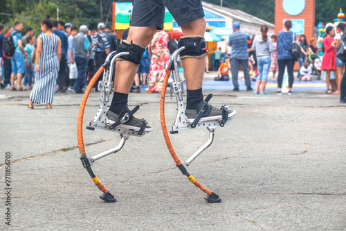 Modern youth entertainment - jumping stilts photo