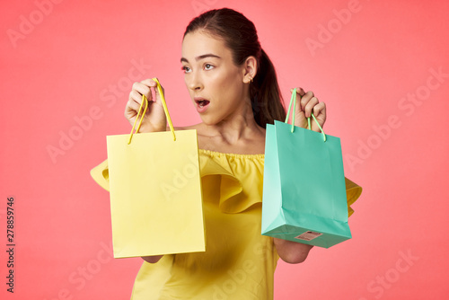 woman with shopping bags and credit card