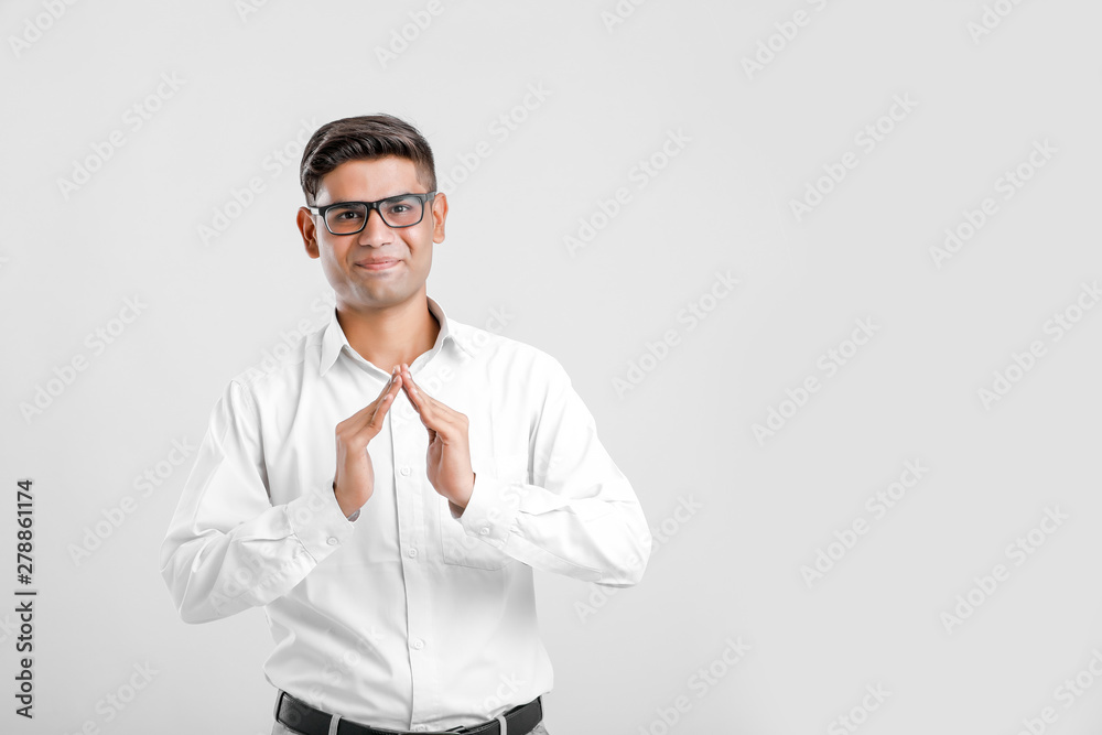 Young Man showing Home gesture with hand Young Man showing Home gesture with hand