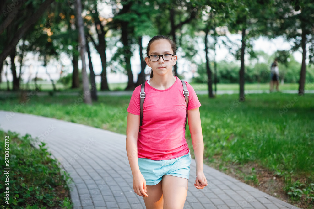 Girl teenager with a backpack. Girl teenager with a backpack.