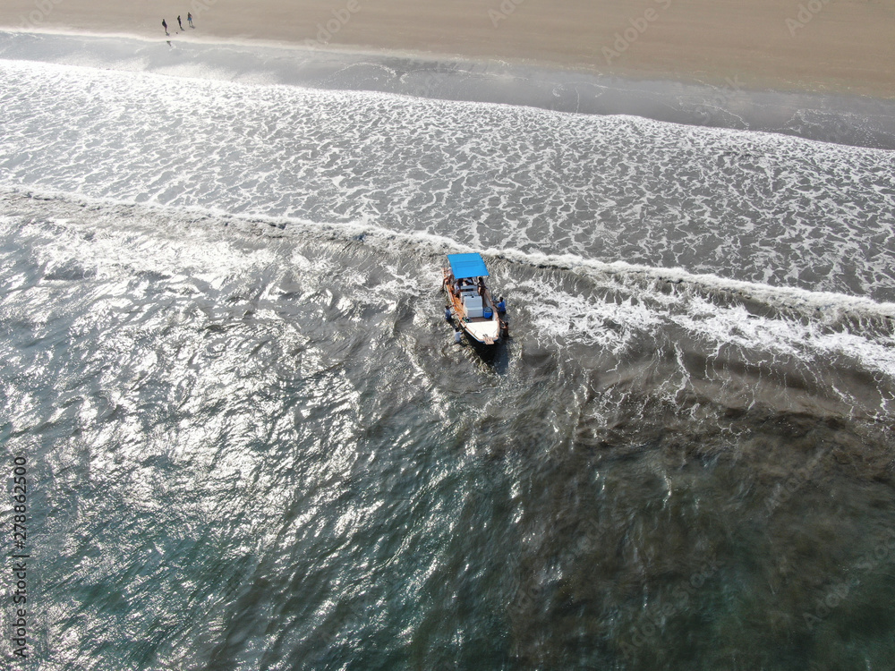 Naklejka premium Boat at the Beach