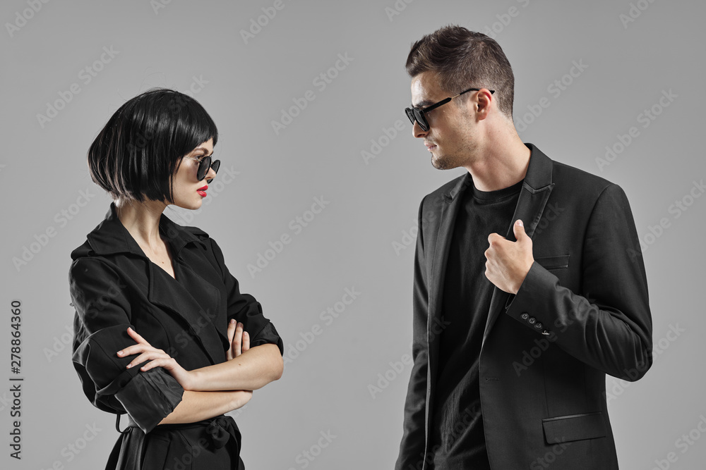 man and woman fighting over white background man and woman fighting over white background