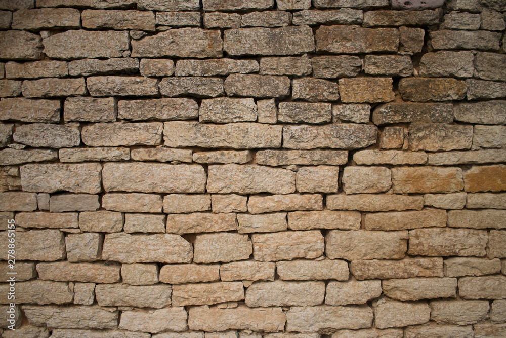 background of a wall made of stone bricks