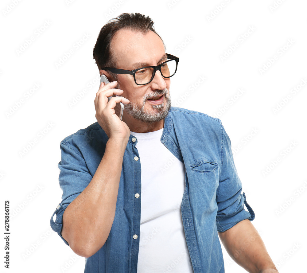 Portrait of handsome mature man talking by mobile phone on white background Portrait of handsome mature man talking by mobile phone on white background