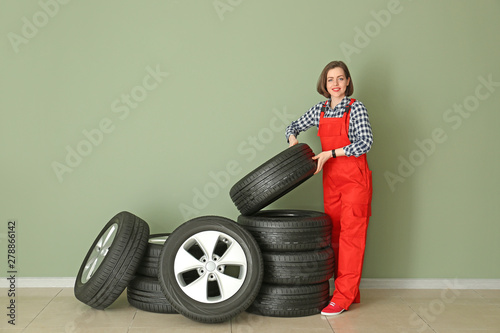Young female mechanic with ...