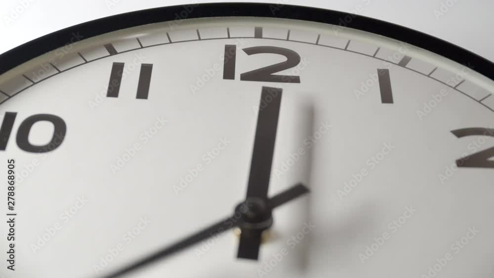 Clock Face Close Up in Time Lapse on Wall in Office Clock Face Close Up in Time Lapse on Wall in Office