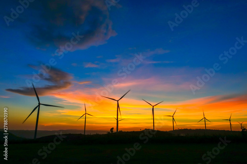 Wind turbine farm from clean energy. Wind power for electricity. © Golden House Images