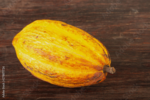 Wallpaper Mural yellow cacao pod on wooden background Torontodigital.ca