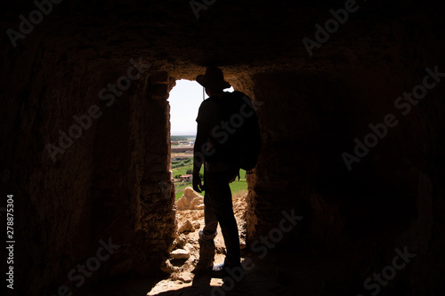 backpacker traveler with hat and white shirt