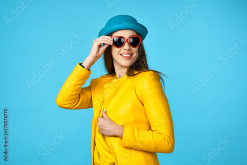 woman in hat and sunglasses