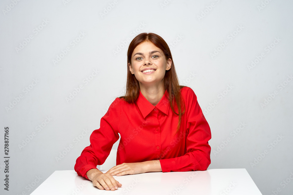 young woman sitting on the floor and reading a book young woman sitting on the floor and reading a book