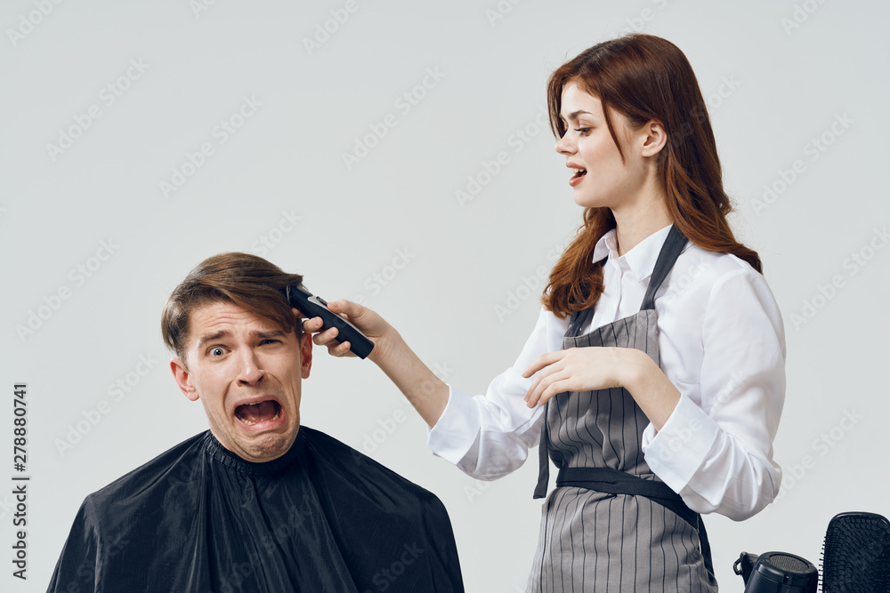 man and woman fighting over white background man and woman fighting over white background