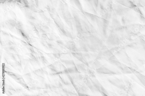 White fabric texture background. Wrinkled, crumpled fabric.