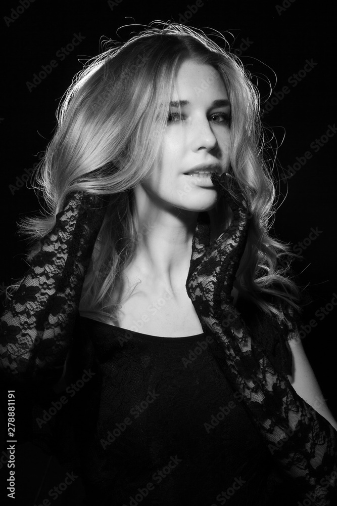 Portrait of a girl on a black background. Portrait of a girl on a black background.